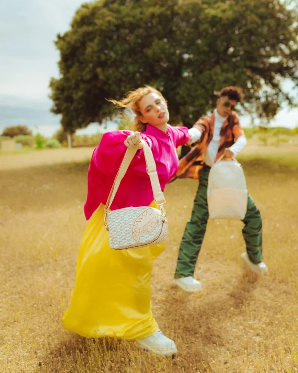 CR??ME DE LA CR??ME BACKPACK SLING
