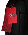 THE GOLDEN FANG SHARK BACKPACK