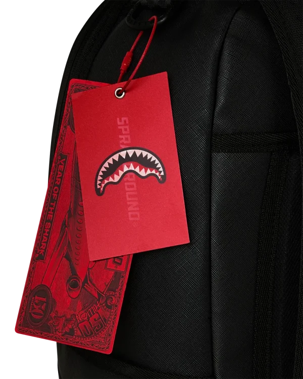 THE GOLDEN FANG SHARK BACKPACK